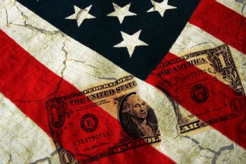 American flag and a ripped dollar bill