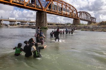 Asylum seekers cross the Rio Grande Mexico United States