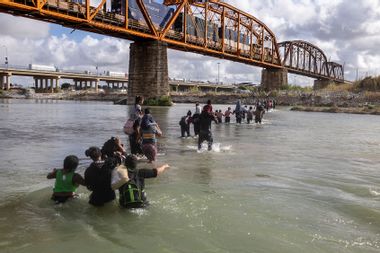 Asylum seekers cross the Rio Grande Mexico United States