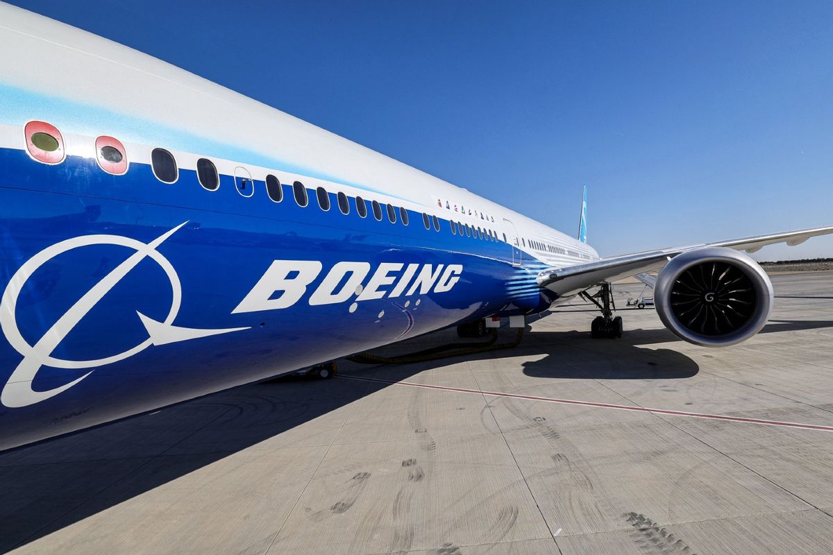 This picture taken on November 13, 2023 shows a view of the fuselage and one of the engines of a Boeing 777-9 jetliner aircraft on the tarmac during the 2023 Dubai Airshow at Dubai World Central - Al-Maktoum International Airport in Dubai.  (GIUSEPPE CACACE/AFP via Getty Images)