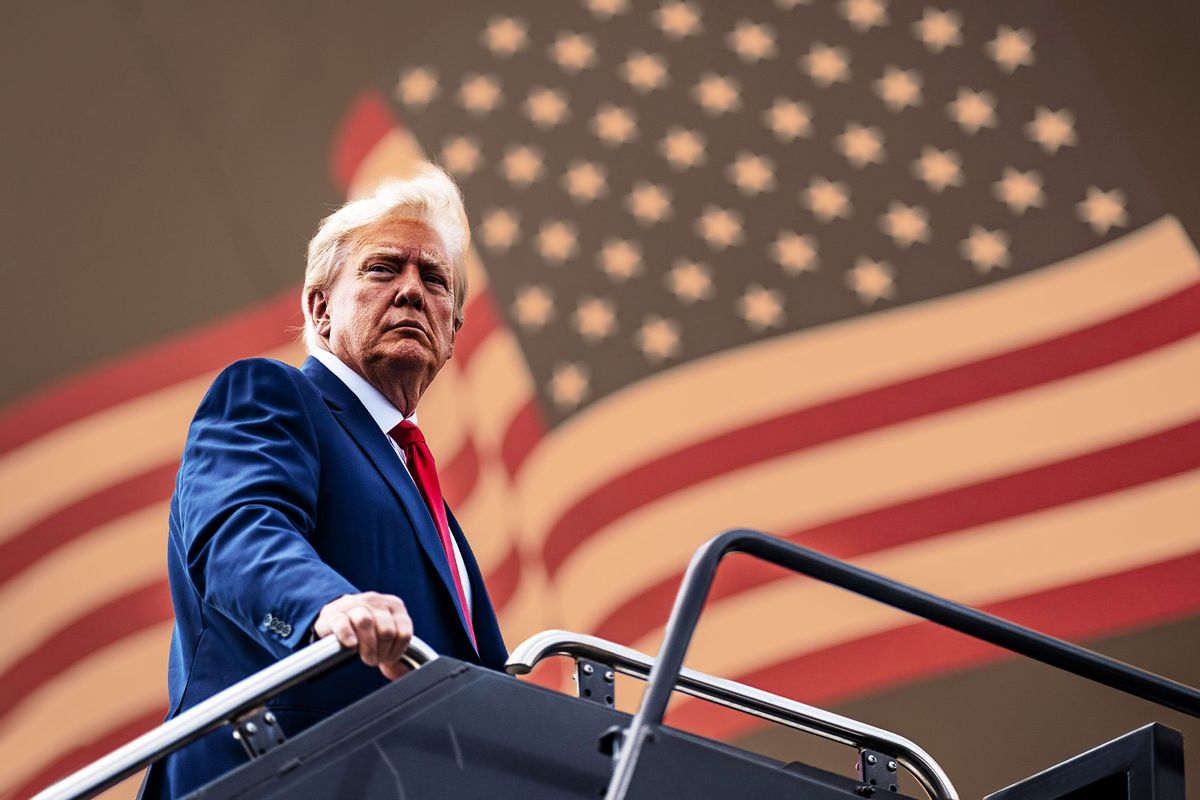 Former President Donald Trump boards his airplane, known as "Trump Force One," as he heads to speak at campaign events in GA and NC, at Newark Liberty International Airport on Saturday, June 10, 2023, in Newark, NJ. (Photo edit by Salon/Jabin Botsford/The Washington Post via Getty Images)