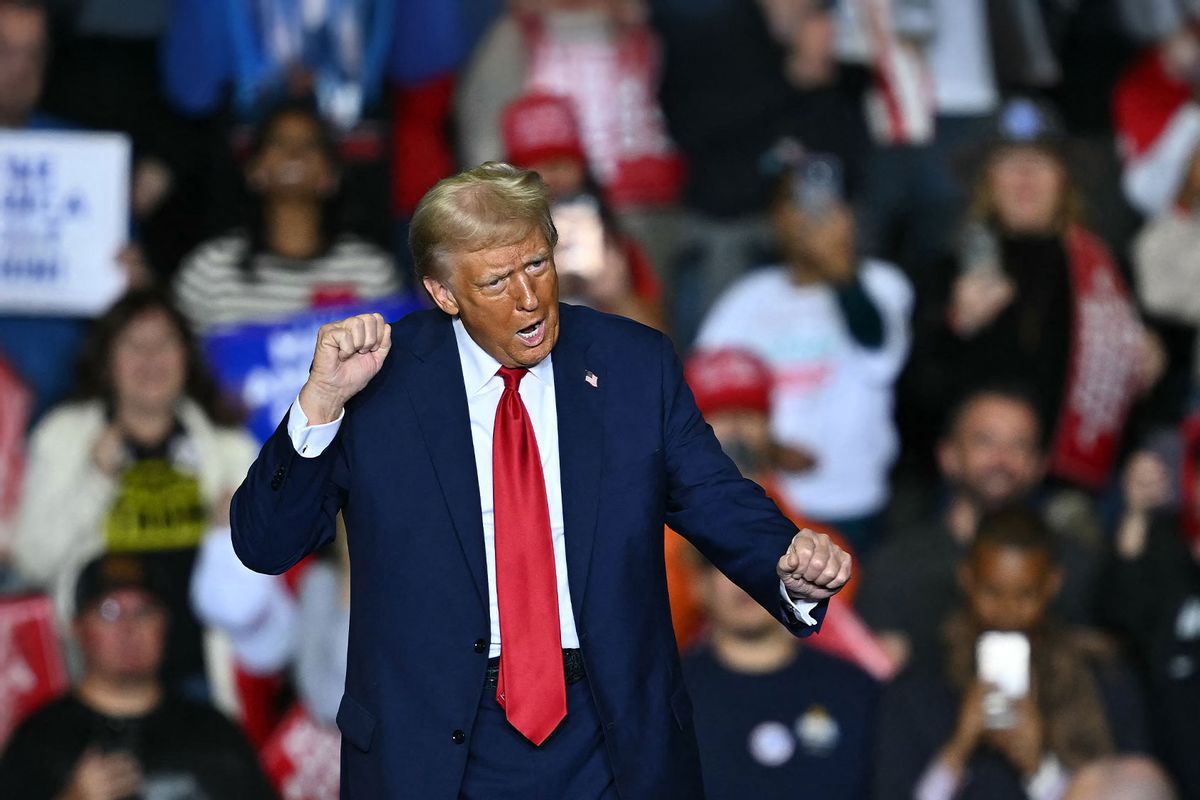 Former US President and Republican presidential candidate Donald Trump dances onstage after his speech during a campaign rally at the PPL Center in Allentown, Pennsylvania, on October 29, 2024. (ANGELA WEISS/AFP via Getty Images)