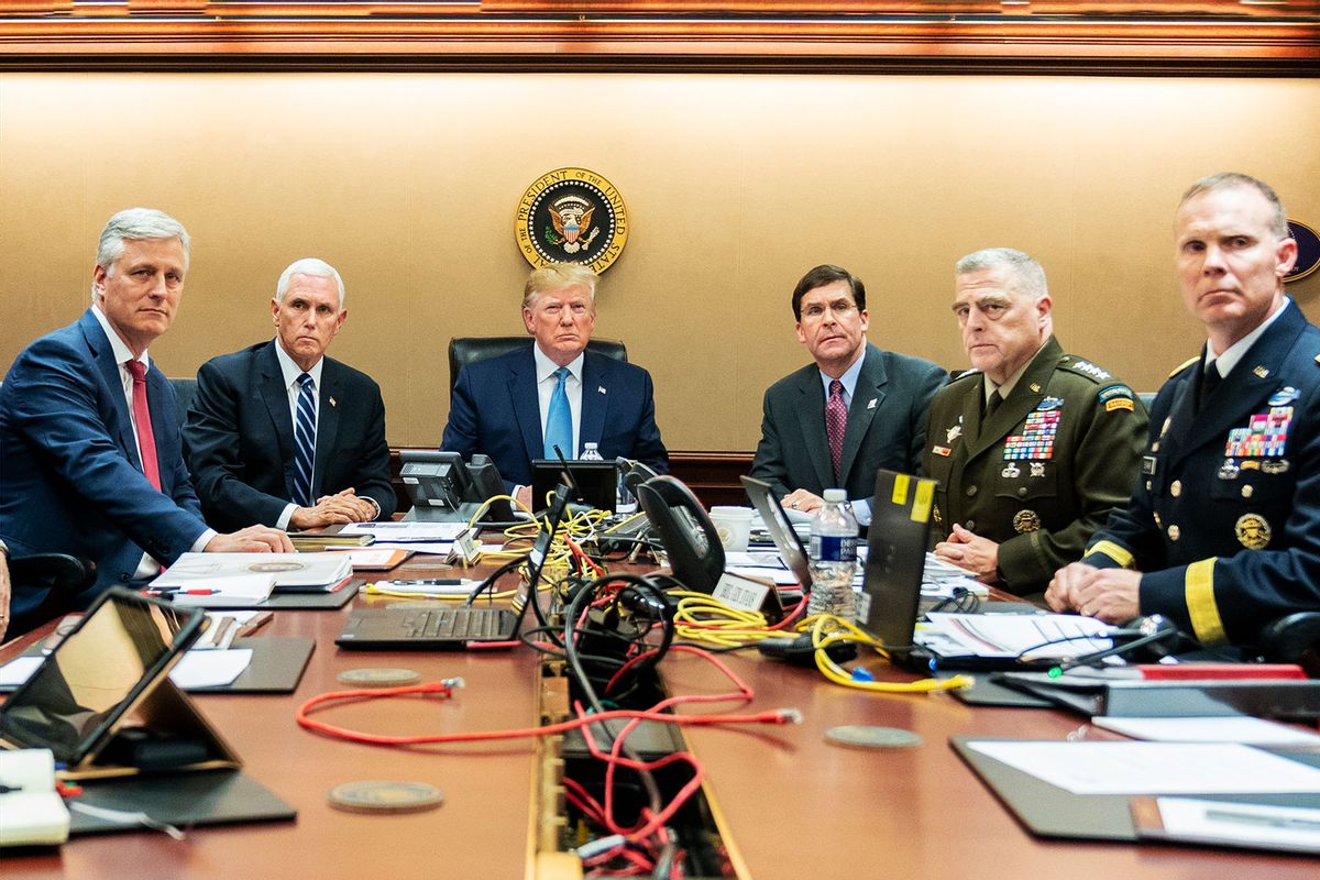 President Donald J. Trump is joined by Vice President Mike Pence (2nd L), National Security Advisor Robert O’Brien (L), Secretary of Defense Mark Esper (3rd R), Chairman of the Joint Chiefs of Staff U.S. Army General Mark A. Milley (2nd R) and Brig. Gen. Marcus Evans, Deputy Director for Special Operations on the Joint Staff in the Situation Room of the White House October 26, 2019 in Washington, DC. (Shealah Craighead/The White House via Getty Images)