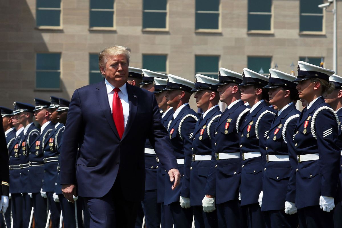 U.S. President Donald Trump inspects the troops during a full honors welcome ceremony on the parade grounds at the Pentagon, on July 25, 2019 in Arlington, Virginia. (Mark Wilson/Getty Images)