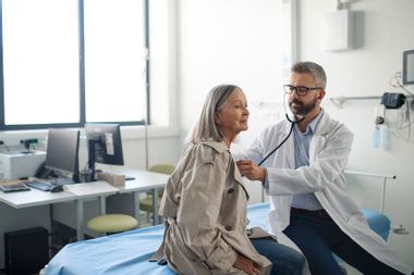 Elderly woman at doctors examination