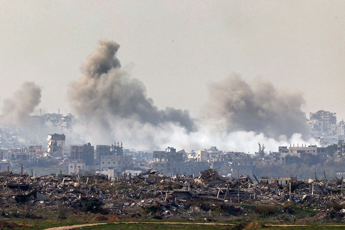 This picture taken from the Israeli side of the border with the Gaza Strip shows smoke plumes rising from explosions above destroyed buildings in the northern Gaza Strip on January 14, 2025, amid the ongoing war between Israel and Hamas. (JACK GUEZ/AFP via Getty Images)