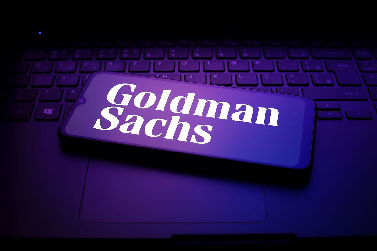 The Goldman Sachs logo appears on a smartphone screen (Jaque Silva/NurPhoto via Getty Images)