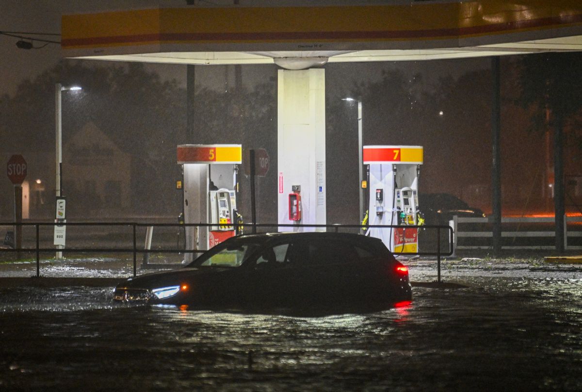 A vehicule is stranded on a water-flooded street after Hurricane Milton made landfall in Brandon, Florida on October 9, 2024.  (MIGUEL J. RODRIGUEZ CARRILLO/AFP via Getty Images)