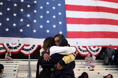 Kamala Harris supporters consoling each other