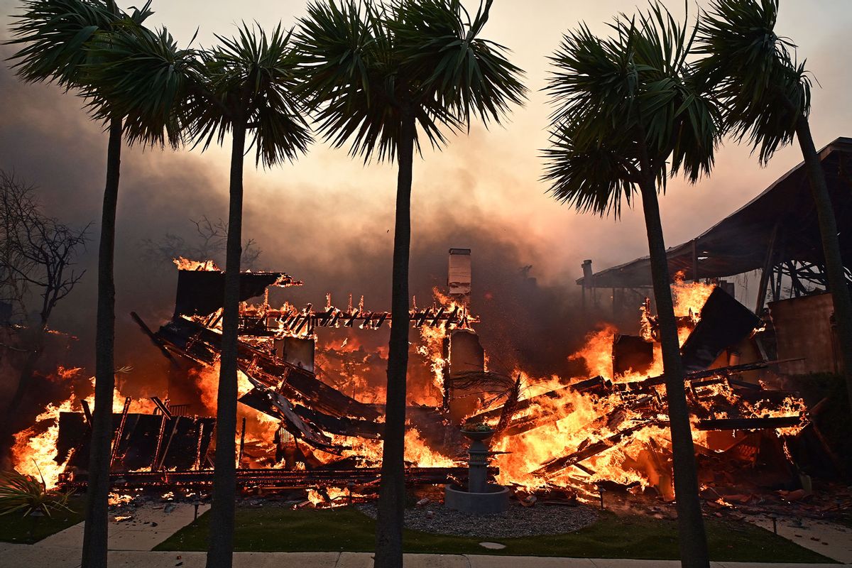 A home burns during the Palisades Fire in Pacific Palisades, California, on January 8, 2025. (AGUSTIN PAULLIER/AFP via Getty Images)