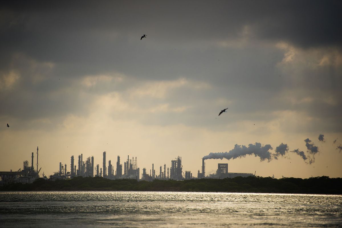 A row of oil refineries line the water of the Port of Corpus Christi. (Sarah L. Voisin/The Washington Post via Getty Images)