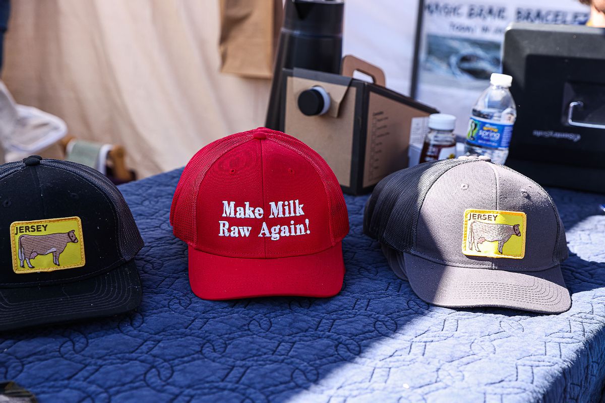 A vendor sells "Make Milk Raw Again" hats at the Homesteaders of America Conference held at the Warren County Fairgrounds in Front Royal, Virginia on October 11, 2024. (Valerie Plesch for The Washington Post via Getty Images)